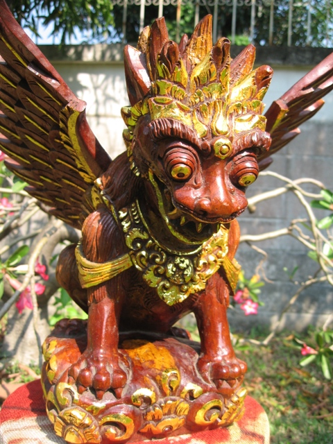 hand carved garuda in gold from bali