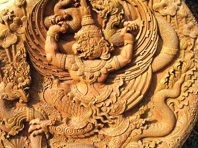 Garuda holding down Naga Teak Medallion