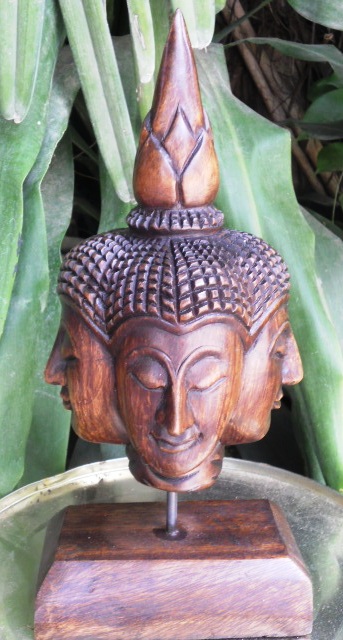 Four Face Full Buddha Head on Stand Oak Finish