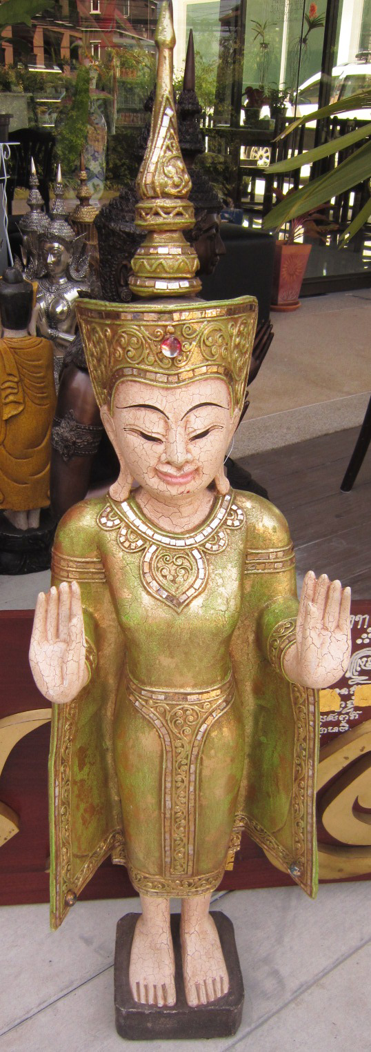 Hand carved standing Sukothai Buddha